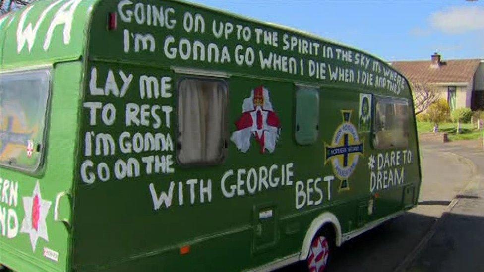 The NI football fans' caravan has been painted in the team's colours