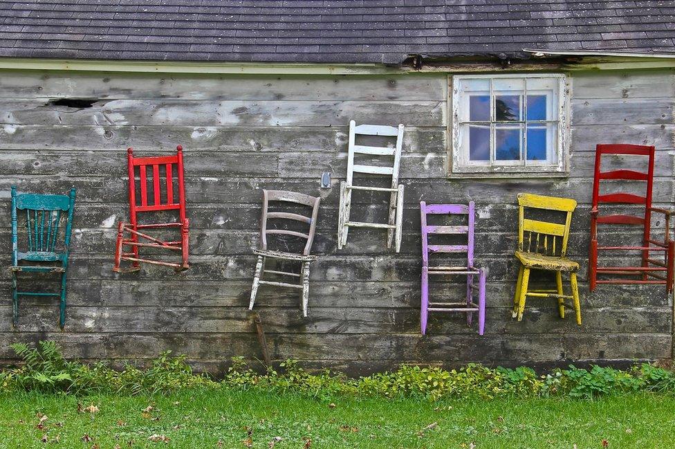 Chairs on the outside of a home