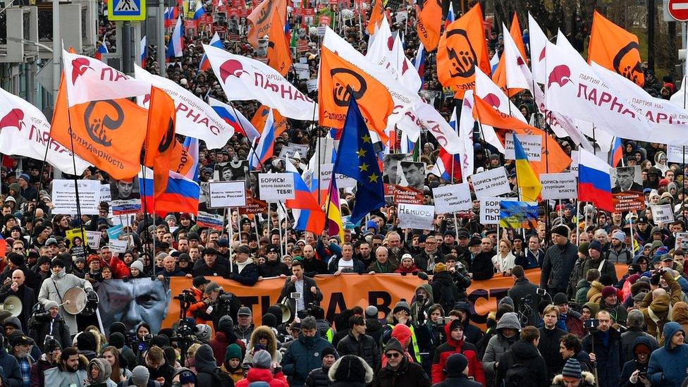 Opposition supporters march in memory of murdered Kremlin critic Boris Nemtsov in downtown Moscow on 29 February, 2020.