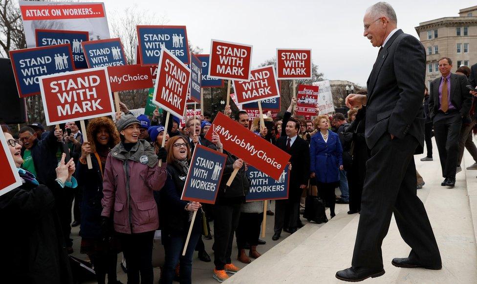 Mark Janus is cheered by supporters outside of the United States Supreme Court in Washington, U.S., February 26, 2018.