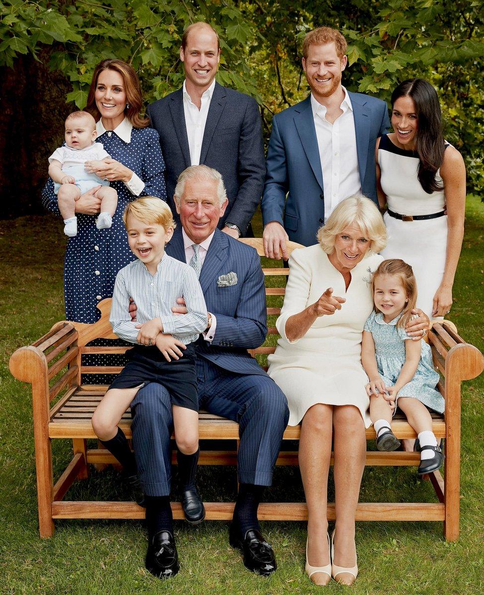 Prince Louis, the Duchess of Cambridge, the Duke of Cambridge, the Duke of Sussex and the Duchess of Sussex. (front row left to right) Prince George, the Prince of Wales, the Duchess of Cornwall and Princess Charlotte, in the gardens of Clarence House