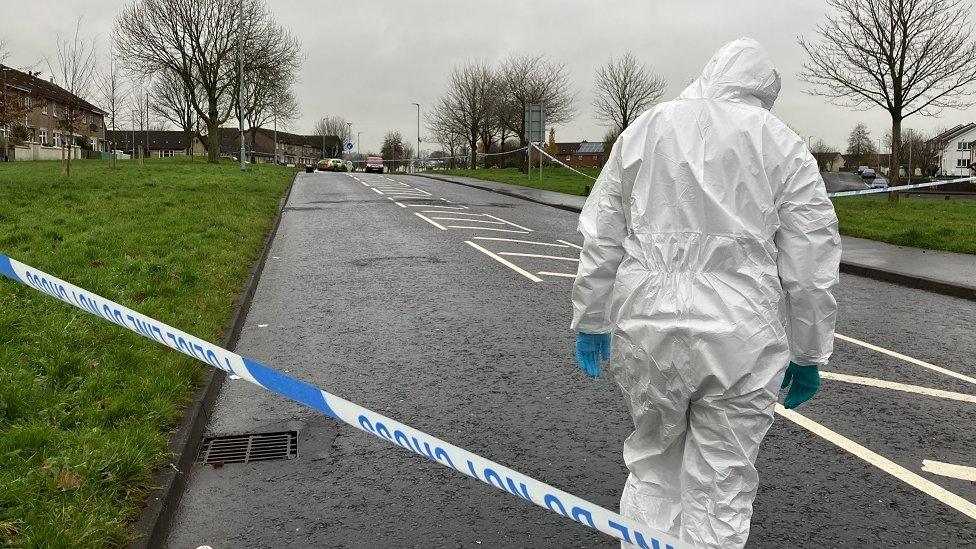 A police forensic officer at the scene in Fergleen Park on Sunday