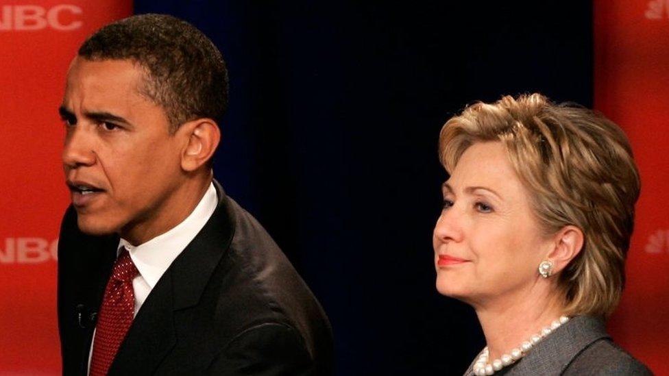 Democratic presidential candidates Sen. Barack Obama and Sen. Hillary Clinton stand on stage prior to the first debate of the 2008 presidential campaign on 26 April 2007 in South Carolina