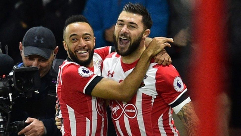 Southampton striker Charlie Austin (right) celebrates scoring after 41 seconds against Everton