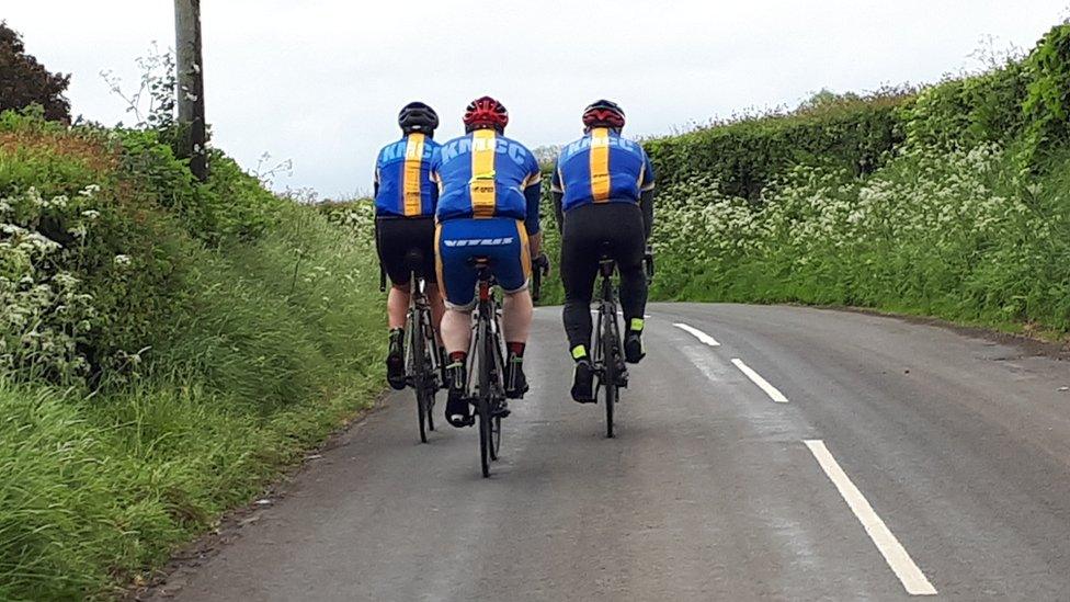 Cyclists on the road