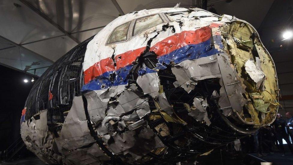 The wrecked cockipt of MH17 is presented to the press on 13 October 2015