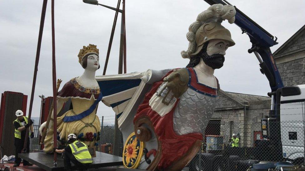 Figureheads on their way to be restored