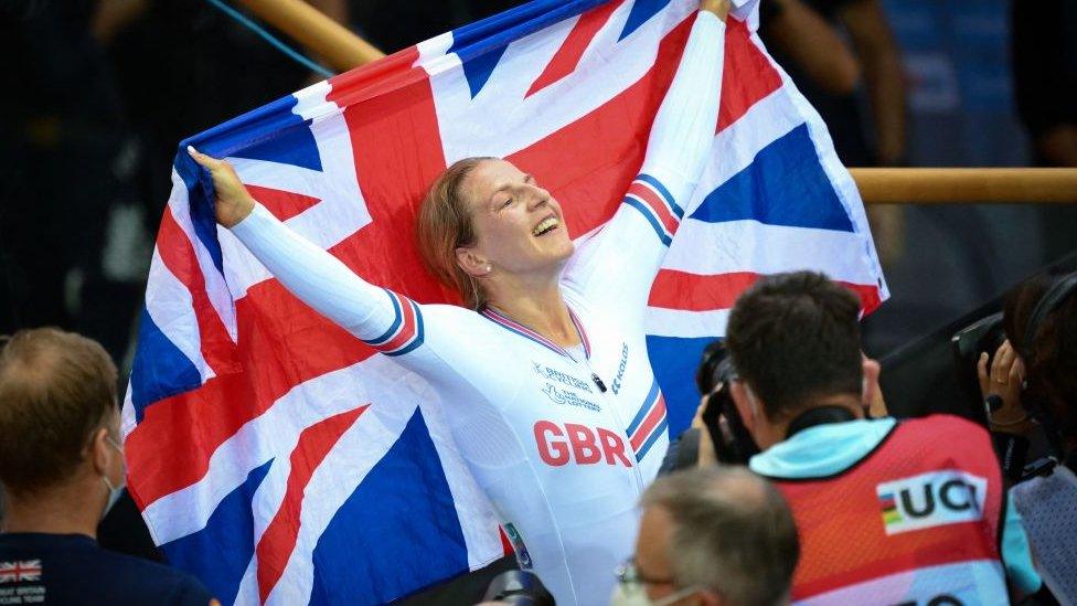 Great Britain's Neah Evans celebrates her victory after winning the Women's Points Race 25km final during the UCI Track Cycling World Championships at the Velodrome of Saint-Quentin-en-Yvelines, southwest of Paris, on October 16, 2022