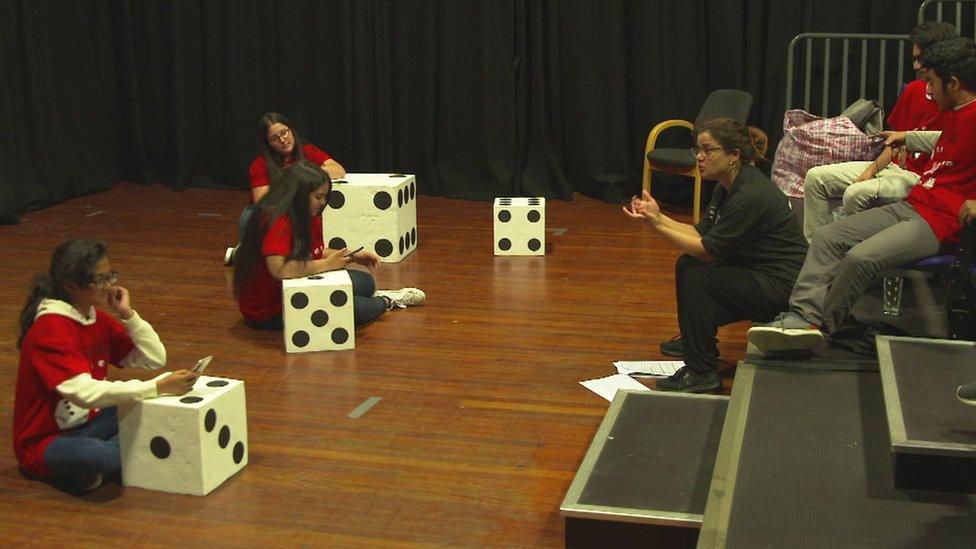 Children acting at a rehearsal for a play