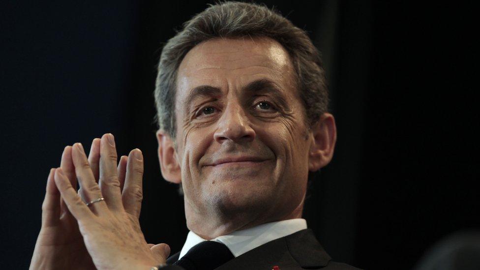 This file photo taken on May 26, 2015 shows former French president Nicolas Sarkozy looking on during a meeting in Le Havre, northwestern France