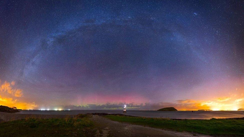 The Milky Way with the Northern Lights over Trwyn Du Lighthouse, near Penmon, Anglesey