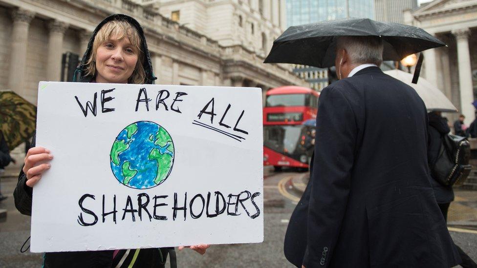 Extinction Rebellion protestor outside of the Bank of England in 2019.