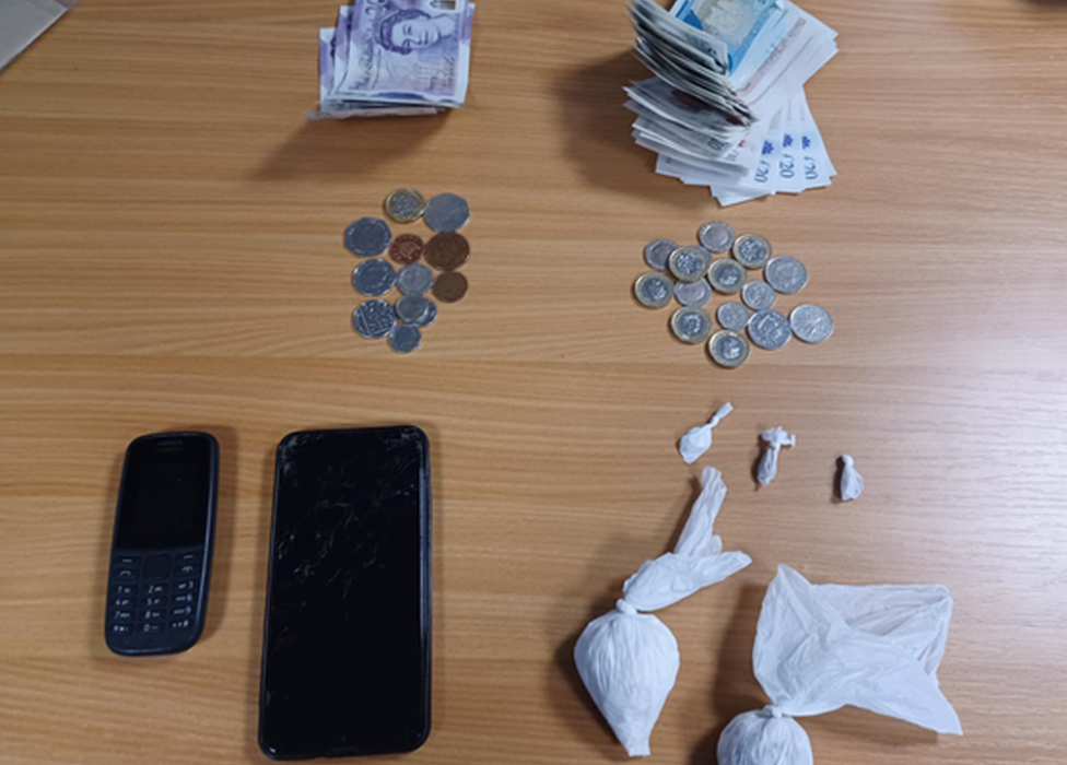 Mobile phones, drugs and cash