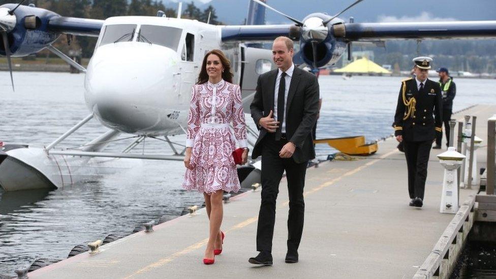 Duke and Duchess of Cambridge getting off sea plane