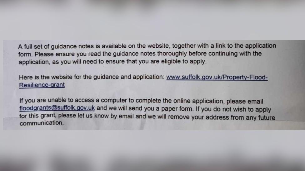 Section of flood grant letter to residents from Suffolk County Council asking for people without computer access to email for more information.