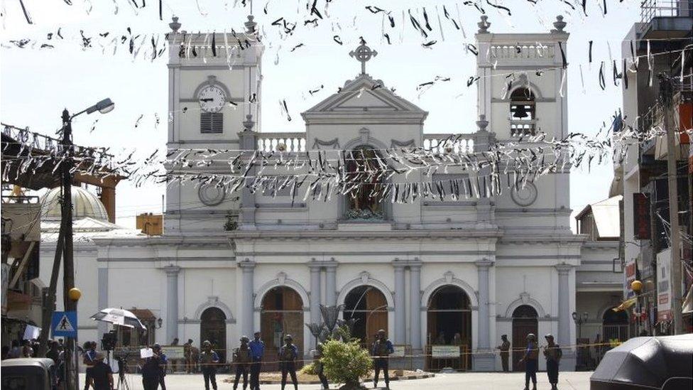 White bunting being in front of St Anthony's Church as the city prepares for the funerals of the blast victims in Kochchikade, Colombo, Sri Lanka, 22 April 2019.