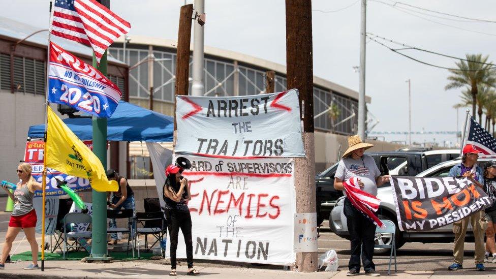 Trump supporters rally outside the ballot counting headquarters