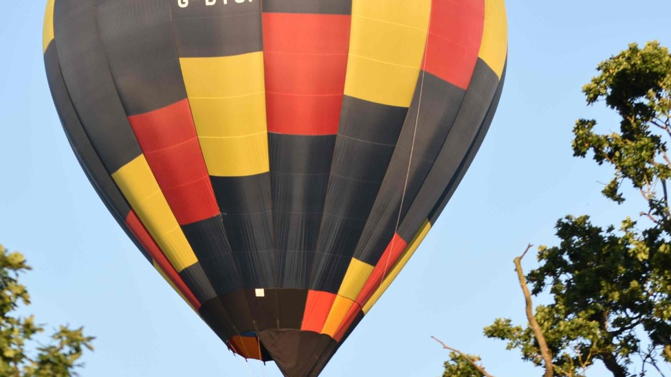 A hot air balloon flying in the sky