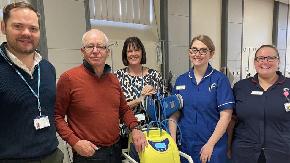 Brian Conroy with medical team at Clatterbridge Cancer Centre