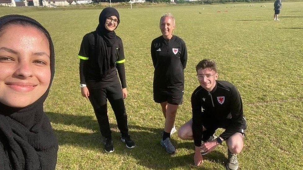 The sisters on the football pitch