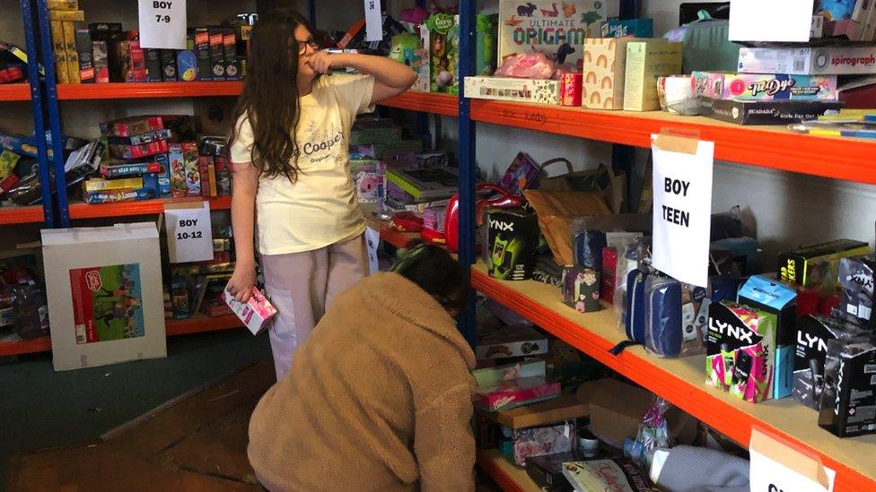 Ava and Chantal looking at some of the stock at the Salvation Army