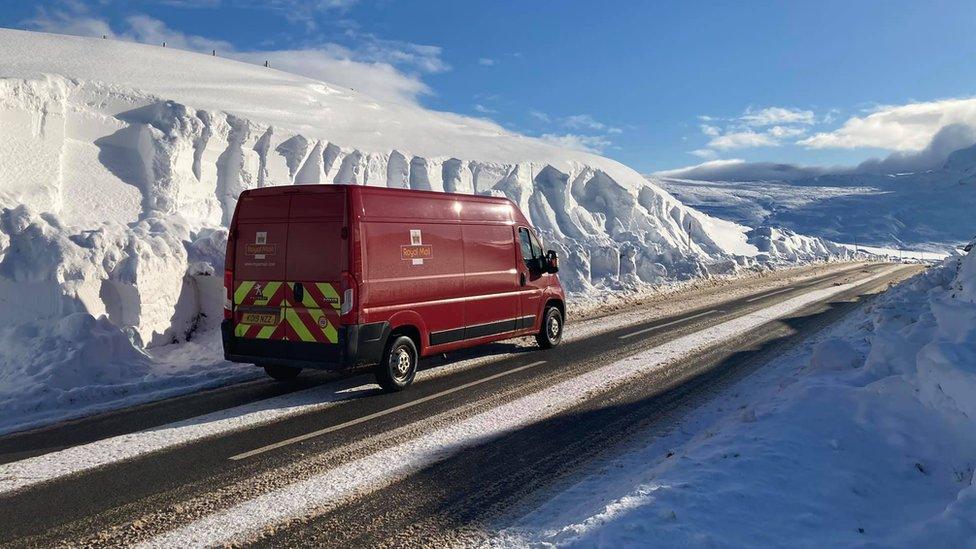 Van and snow drifts