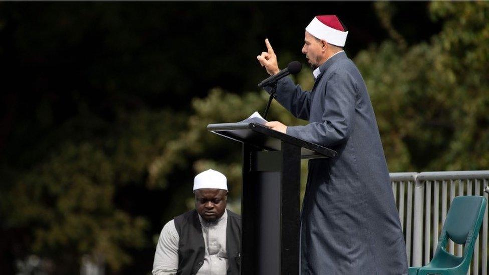 Gamal Fouda, the imam (lead cleric) of tragedy-stricken Al Noor mosque, delivers a sermon ahead of a two-minute observation of silence for victims of the twin mosque massacre, during congregational Friday prayers and memorial gathering at Hagley Park in Christchurch on March 22, 2109.