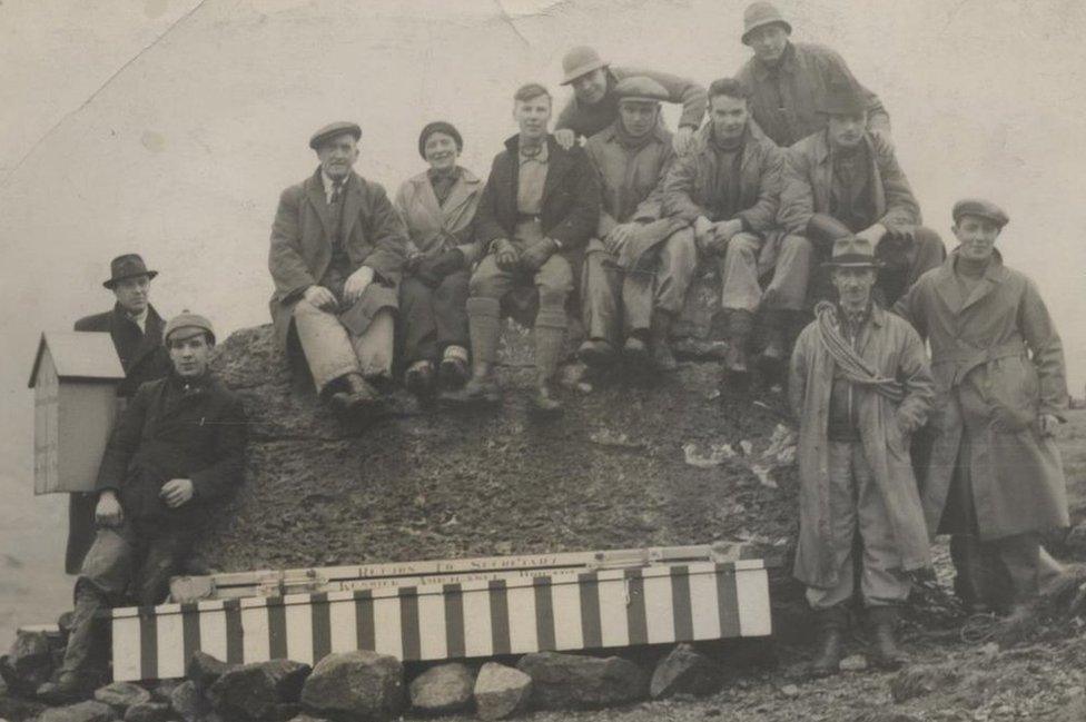 Mountaineers and the stretcher box on Sty Head in 1938