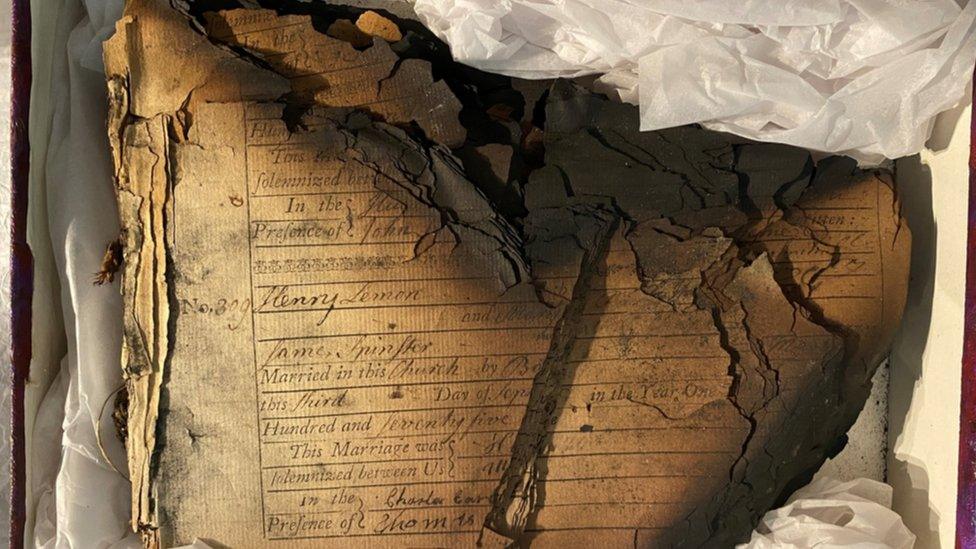 Charred remains of church records