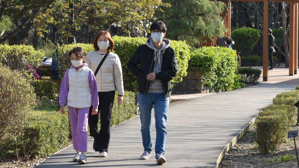 a-family-walking-together-in-south-korea