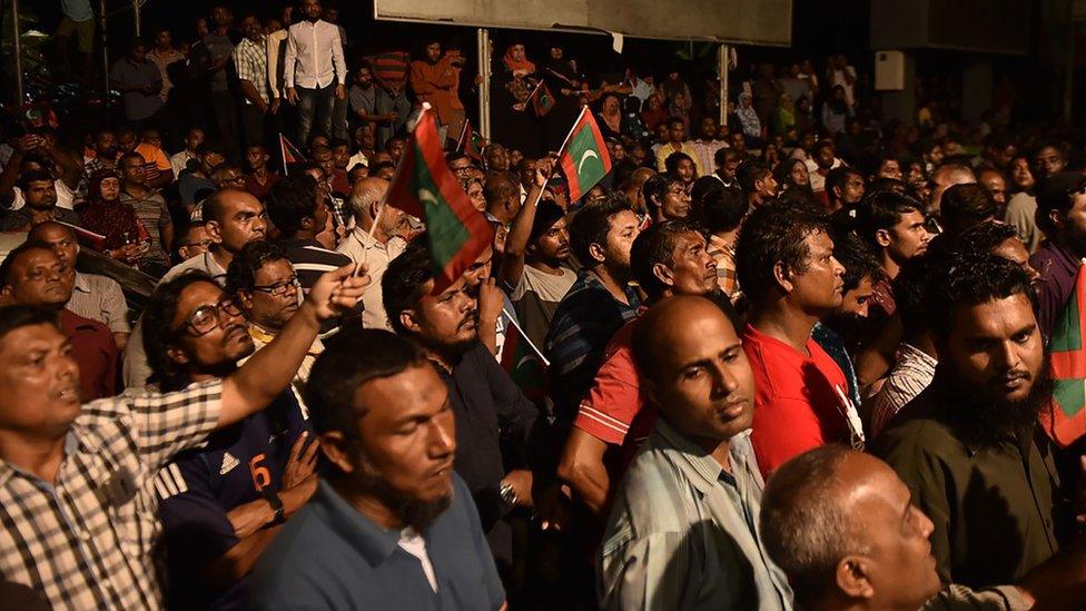 Supporters of the main opposition Maldivian Democratic Party (MDP) celebrating the Supreme Court's decision to order the release of jailed political leaders near the capital Male on Friday 2 February 2018