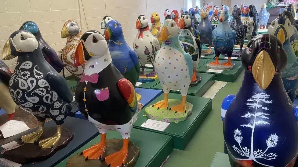 Sculptures of puffins