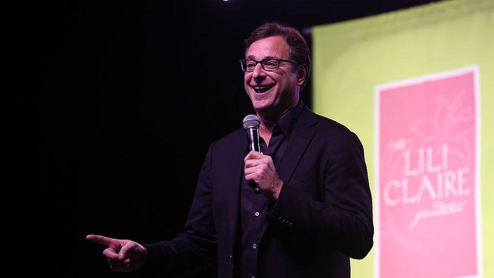 Bob Saget performing on stage