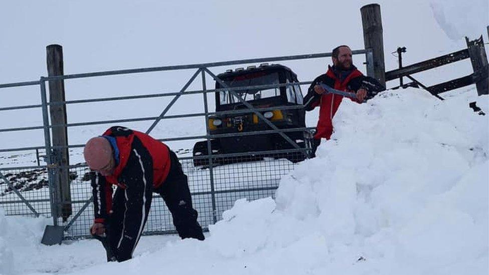 Clearing snow on way to bothy