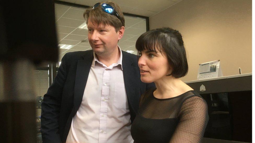 Graham Precey and Audrey Fontaine examine a 3D printer at a business incubator in Dieppe