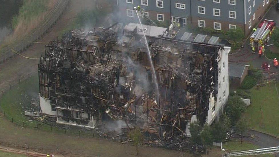 Aerial shot of block of flats after the fire