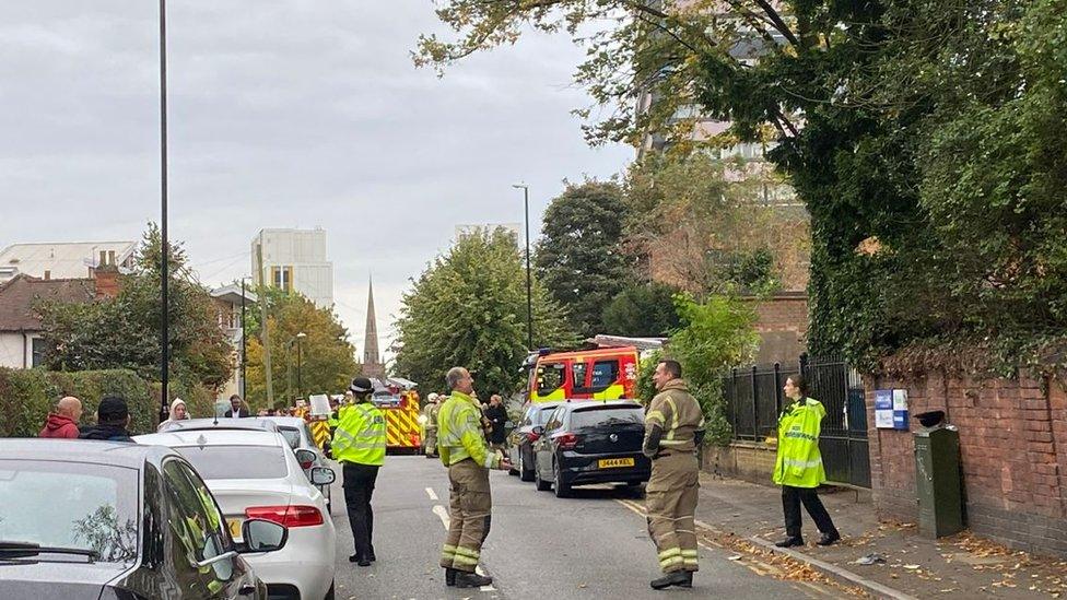 Fire and ambulance crews in the street