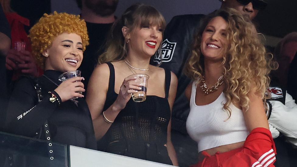 Rapper Ice Spice, Singer Taylor Swift and Actress Blake Lively react prior to Super Bowl LVIII between the San Francisco 49ers and Kansas City Chiefs at Allegiant Stadium on February 11, 2024 in Las Vegas, Nevada