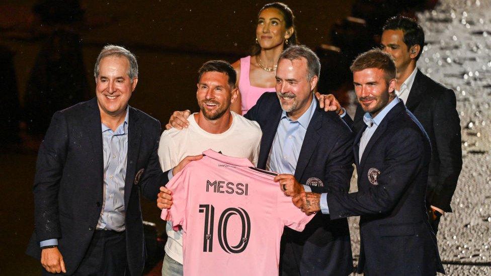 Lionel Messi alongside the team's owners including David Beckham.