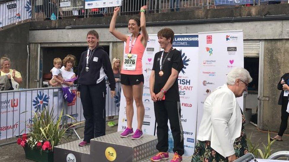 Ellie Lacey on the podium winning gold in the 800m at the British Transplant Games