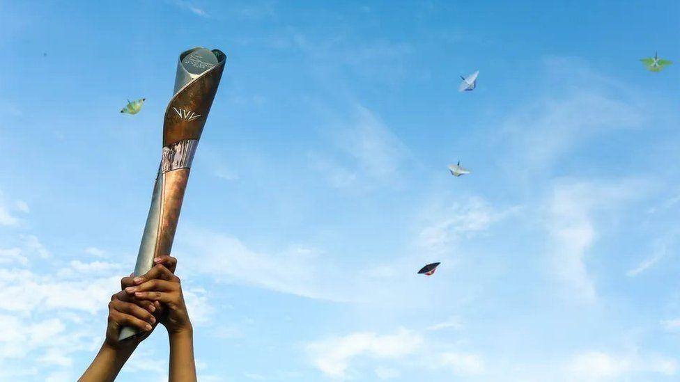 A photo of the Queen's baton