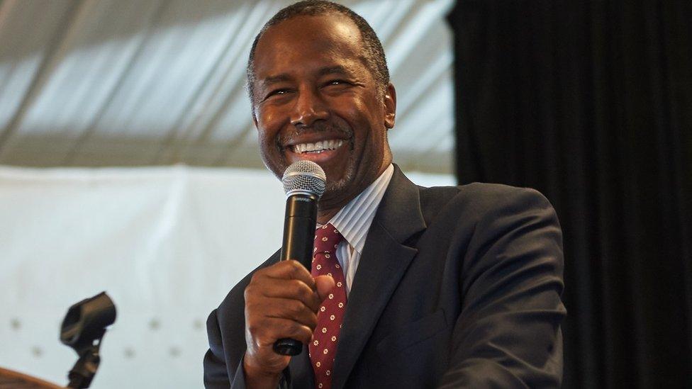 Ben Carson smiles at a speaking event in Missouri.