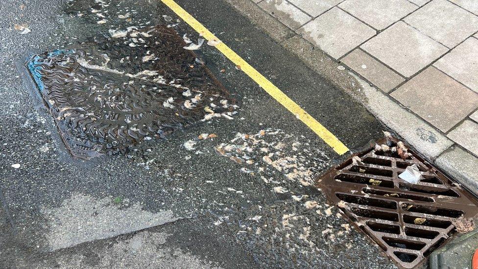 Drain overflowing with sewage in Kingsbridge