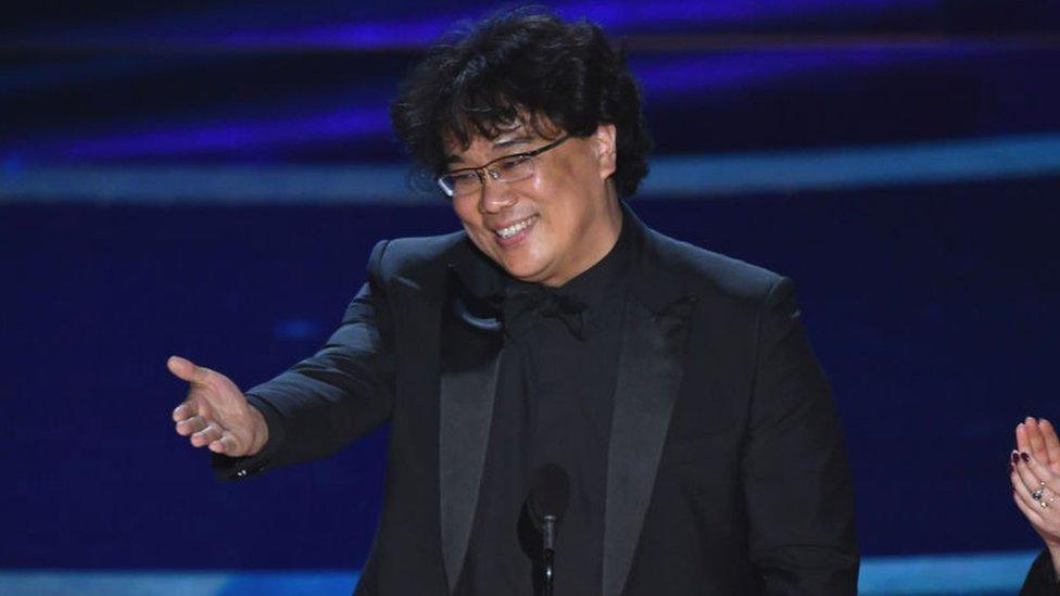 outh Korean film director Bong Joon Ho accepts the award for Best Director