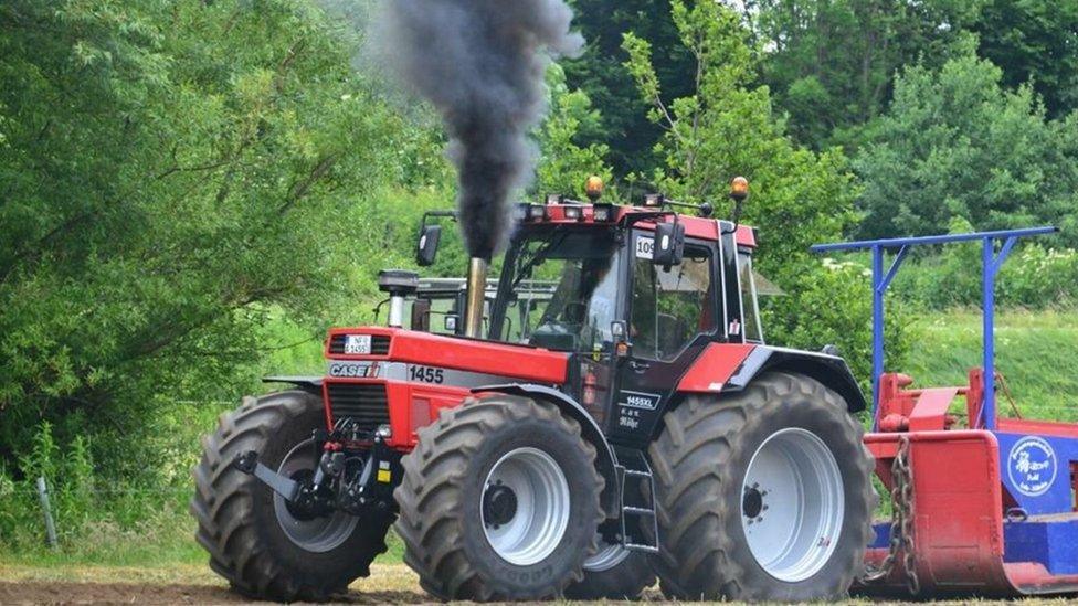 A tractor with a modified exhaust