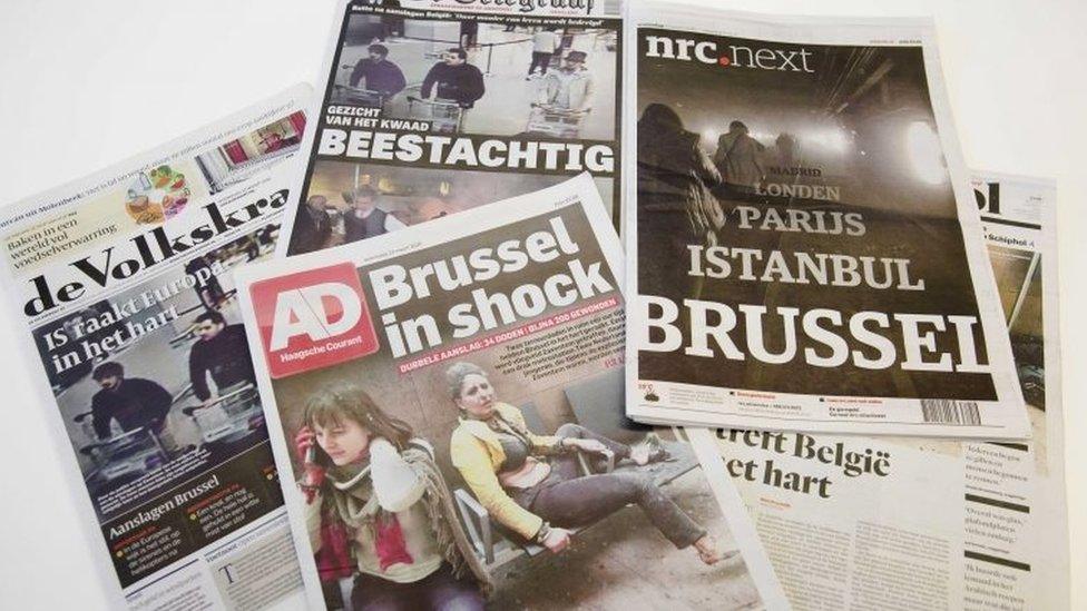 Front pages of several Dutch newspapers,in the Hague, The Netherlands, 23 March 2016 one day after at least 31 people were killed in and hundreds injured in bombings at Zaventem Airport and on a metro train in Brussels, Belgium, 22 March 2016.