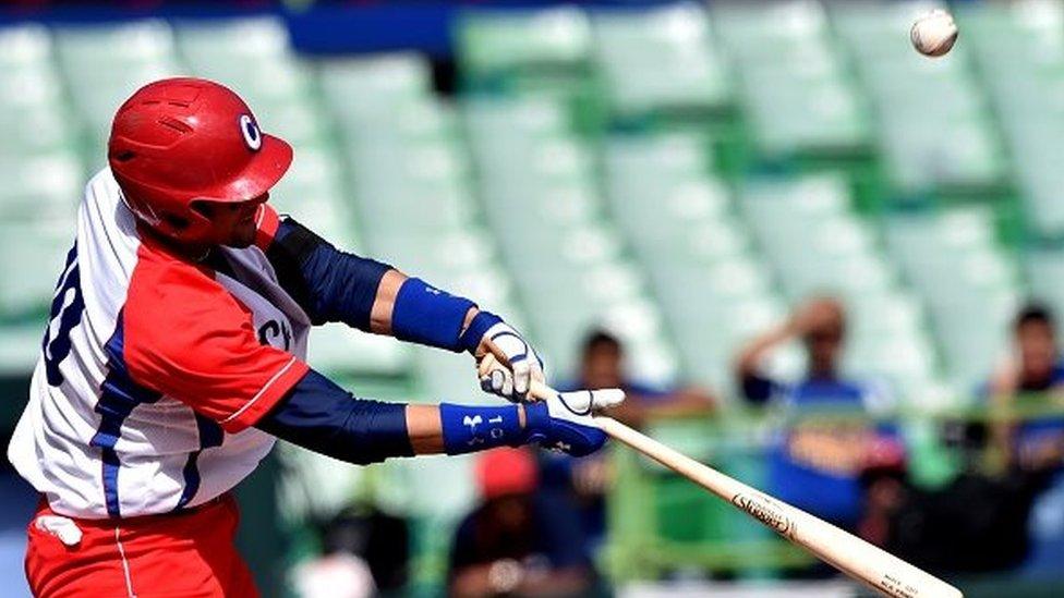 Cuban National baseball infielder Yulieski Gurriel hits the ball in the 5th inning against the Venezuela National baseball team during the Serie Del Caribe February 5, 2015 in San Juan, Puerto Rico.