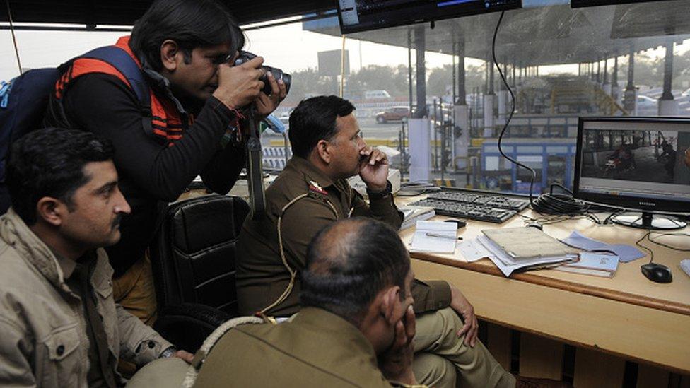 Police going through the CCTV footage of toll Naka at DND flyover after it was vandalized by the supporters of Karni Sena, on January 21, 2018 in Noida,