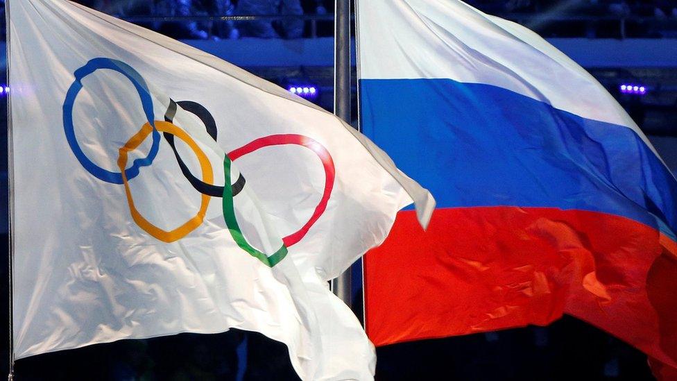 Olympic and Russian flags