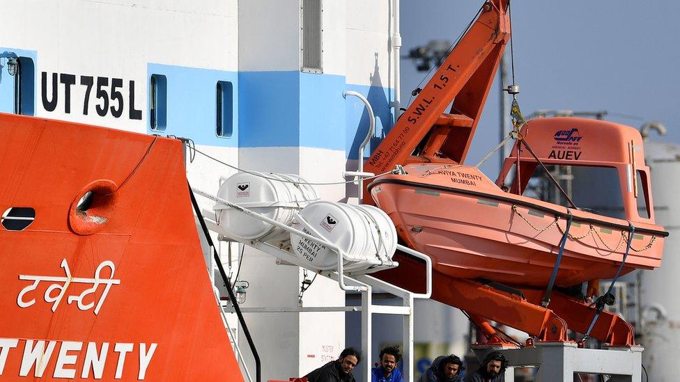 Captain Nikesh Rastogi, 43, from Mumbai, (left) with his crewmates